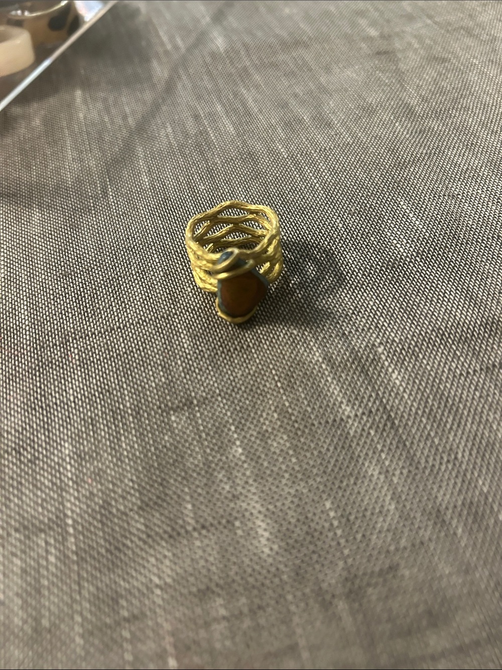 Gold-Tone Woven Band Ring with Amber Stone